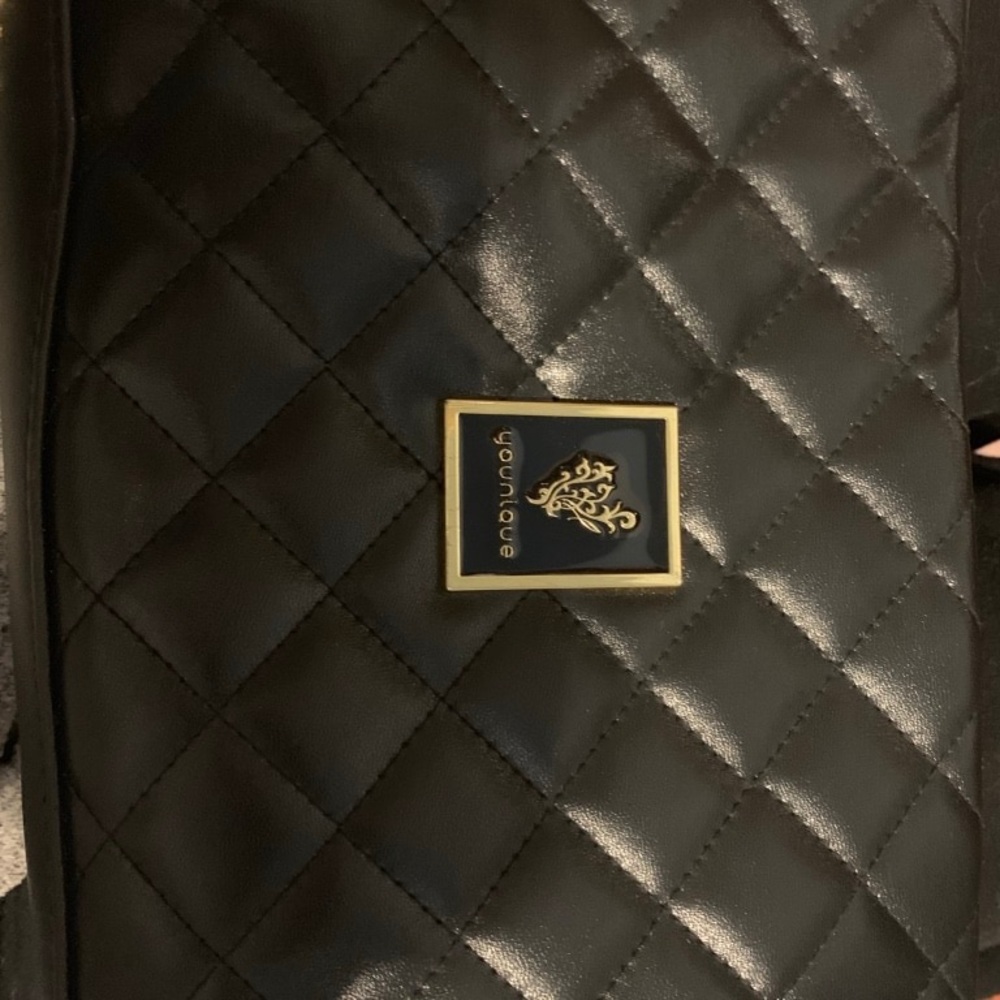 Younique black gold and purple purse